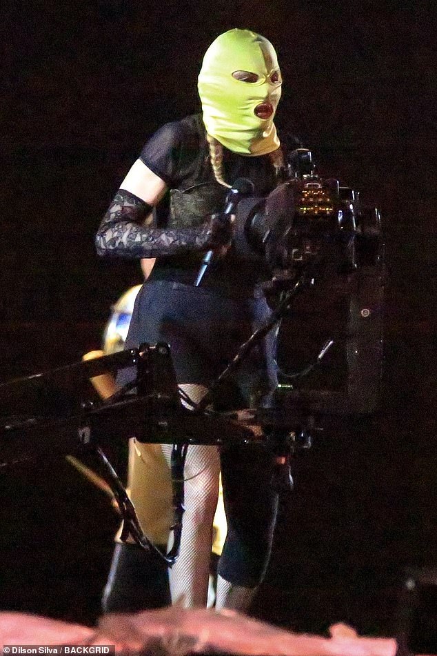 Madonna, 65, wore gimp masks on stage during rehearsals in Rio de Janeiro, Brazil, on Thursday, ahead of her Copacabana shows.