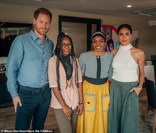 Harry and Meghan pictured with youth ambassadors Maryam, 23, and Purity, 19, during their visit to Abuja.