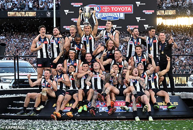 Collingwood players are pictured after winning the 2023 AFL Grand Final against the Brisbane Lions.