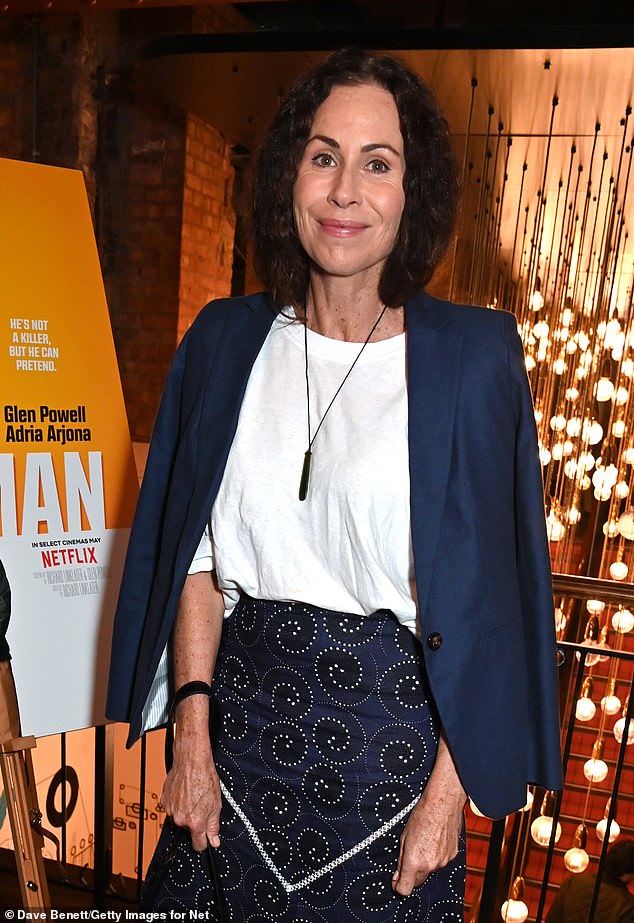 The actress opted for a long skirt that featured a sparkling diamond pattern with a swirl print and a simple white T-shirt.