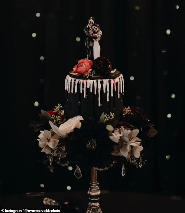 Instead of the usual wedding cake with white icing, Skyelar's cake was, of course, black and even included skeleton versions of her and Colton.