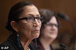 Interior Secretary Deb Haaland (pictured) issued a directive earlier this month banning rangers from openly participating in Pride month events in June, but revoked it on Friday.