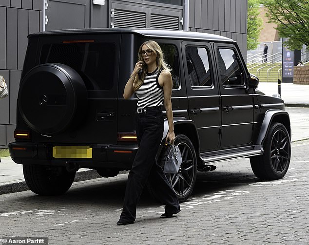 Olivia Attwood cut a stylish figure on Wednesday as she ran some errands in her flashy 127k Mercedes-Benz-G-Class around Manchester city centre.