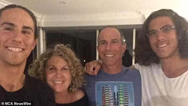 The parents of two Australian surfers who went missing during a trip to Mexico are flying to where they were last seen (Jake, left, and Callum, right, with their parents)