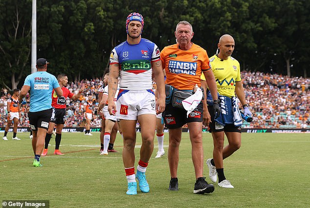 Newcastle captain Kalyn Ponga (pictured being lifted off the ground after a collision) is another NRL player who has had major problems due to head knocks.