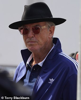 The James Bond actor, 70, was seen wearing a trendy blue Adidas sports jacket and a blue polo shirt as he mingled with family members.
