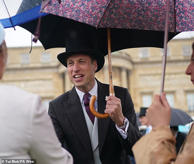 Prince William didn't let the weather ruin his fun day at Buckingham Palace