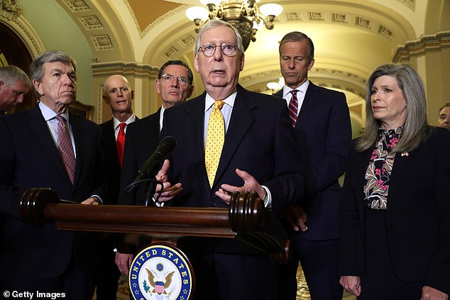 Senate Minority Leader Mitch McConnell (center) announced last week that he would not run for Republican leader in November. Sens. Rick Scott, R-Fla. (second from left) and Sen. John Thune, R-Fla., (second from right) have announced they are in the race to replace him.