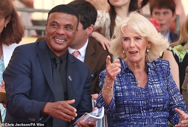 Queen Camilla and William Clements, vice president of global sponsorships and sports marketing at Mars, attend the final day of the Badminton Horse Trials in Gloucestershire.