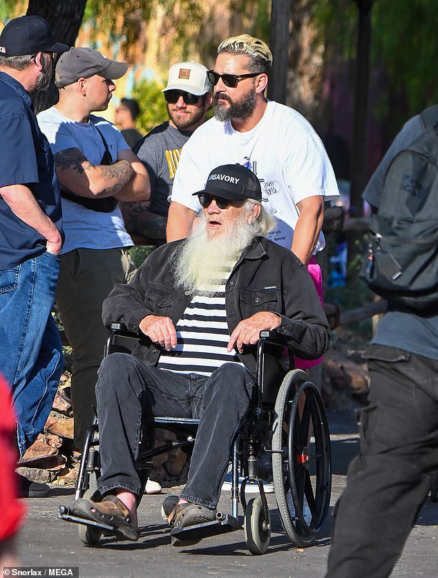 Shia also helped by pushing his father, Jeffrey LaBeouf, 76, in his wheelchair throughout the park. The two rarely appear together, as Jeffrey lived in Costa Rica for several years until recently.