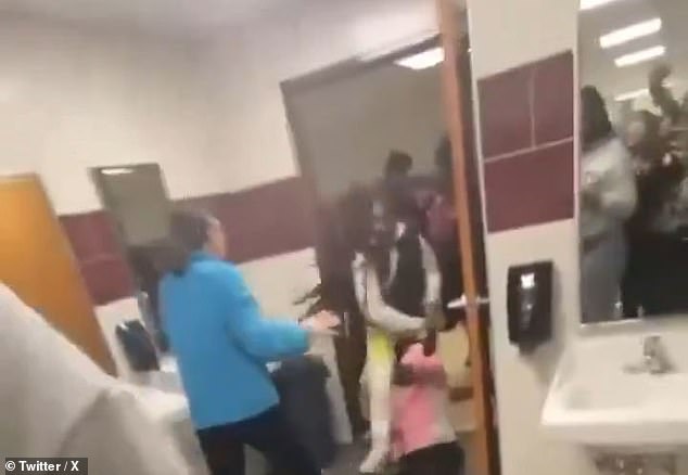 Shocking video has emerged showing 'transgender' student attacking another girl in a school bathroom