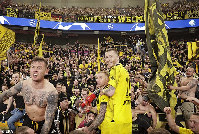 Club legend Marco Reus celebrated with fans just four days after telling the club he was leaving.