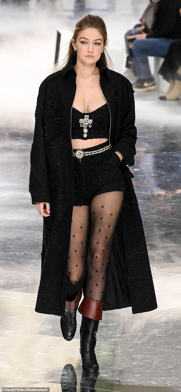 Gigi Hadid walked for Chanel at Paris Fashion Week in 2020 wearing sheer black tights embroidered with the French fashion house's logo.