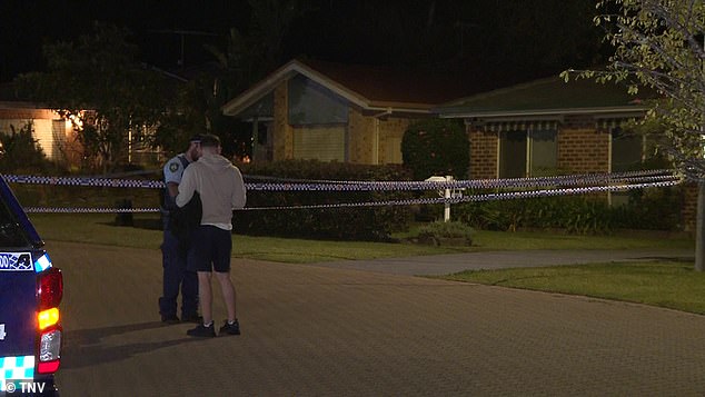 Three people were inside the house on Briggs Place in St Helens Park (pictured) when an unknown gunman fired shots into the property at around 7pm on Wednesday.