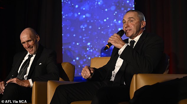 Sydney Swans greats Tony Lockett (pictured left) and Paul Kelly (right) were among nine identities inducted into the inaugural New South Wales Australian Football Hall of Fame on Friday night .