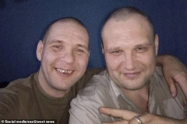 Dmitry Malyshev (left) and Alexander Maslennikov (right) were photographed smiling together in military uniform after being released from prison by the dictator.