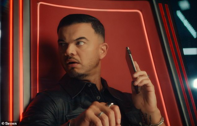The footage begins with series veteran Guy Sebastian, 42, 'recruiting' the new trainers to appear alongside him.