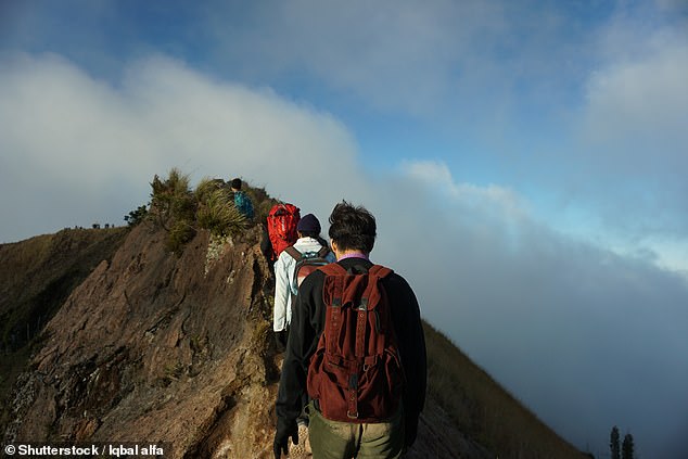 Hike Mount Batur on the Indonesian island of Bali, with Mount Agung in the background