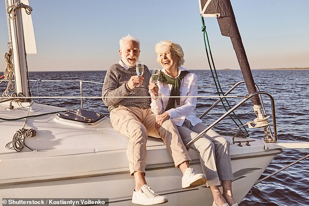 Baby boomers appear to be experiencing a cost-of-living crisis and are at risk of driving up interest rates as they continue to spend (photo is a stock image)