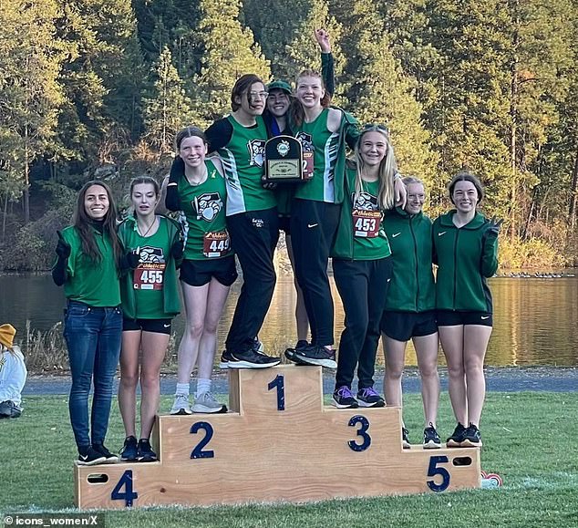 Veronica Garcia also helped East Valley HS win a girls district team title this season. She is seen in first place on the podium with glasses.