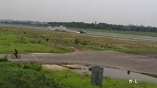 Pilot Muhammad Asim Jawad, 32, appeared to be attempting a Top Gun-type stunt with three low-altitude flap turns when the fuselage of his Yakovlev Yak-130 skimmed the runway (pictured).