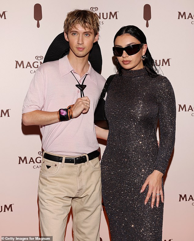 Troye's comments came while speaking at Magnum's beach party at the Cannes Film Festival, where she posed up a storm with Charlie XCX, with whom she had previously collaborated.