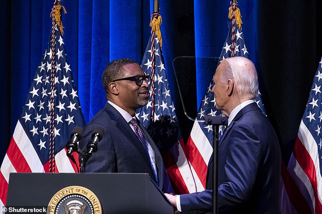 NAACP President Derrick Johnson greets US President Joe Biden at the National Museum of African American History and Culture in Washington, DC, on Friday. Biden is currently touring the country in an attempt to strengthen his dwindling support among black voters.