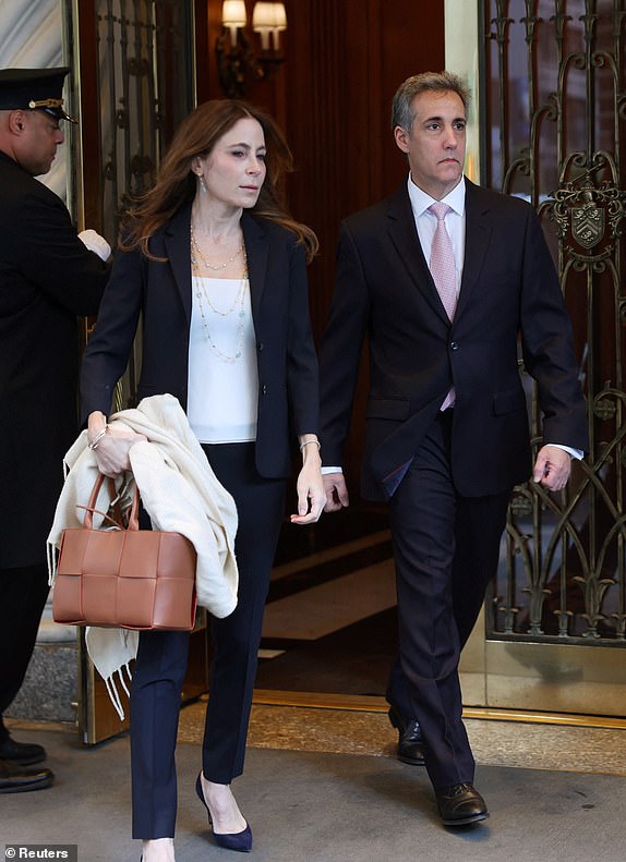 Michael Cohen, former lawyer for Republican presidential candidate and former US President Donald Trump, leaves his Manhattan home to testify in Trump's criminal trial on charges of falsifying business records to hide money paid to silence the porn star Stormy Daniels in 2016, in New York City. , USA, May 13, 2024. REUTERS/Mike Segar