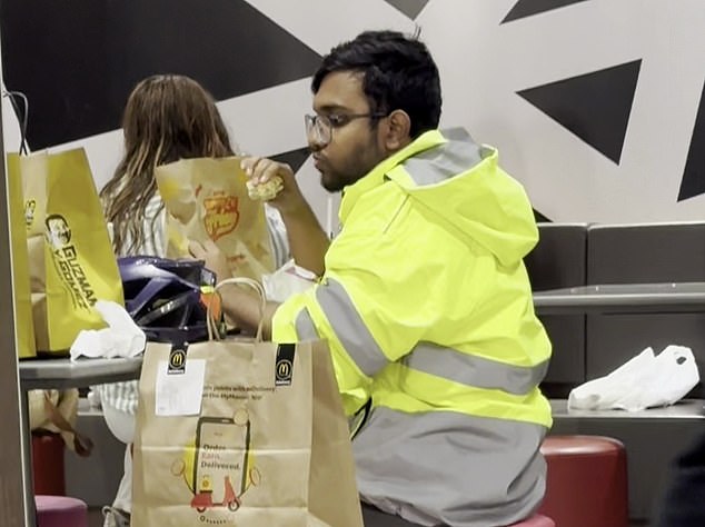 A food delivery driver was wrongly called out after being filmed eating an order, before a man claiming the driver in the photo offered a simple explanation.