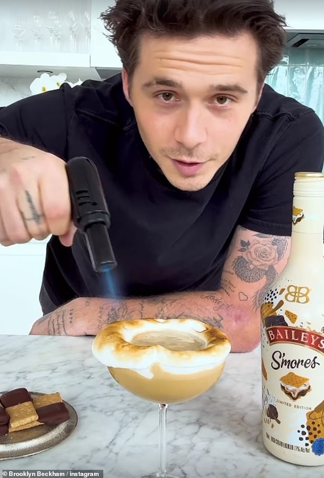 Elsewhere, Victoria's son Brooklyn took to Instagram to show off his s'more toasting skills while promoting a specially flavored version of Baileys cream liqueur.