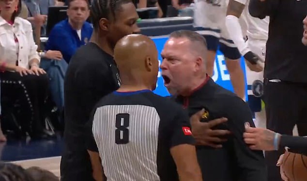 An outraged Nuggets coach, Michael Malone, yelled in the face of referee Marc Davis