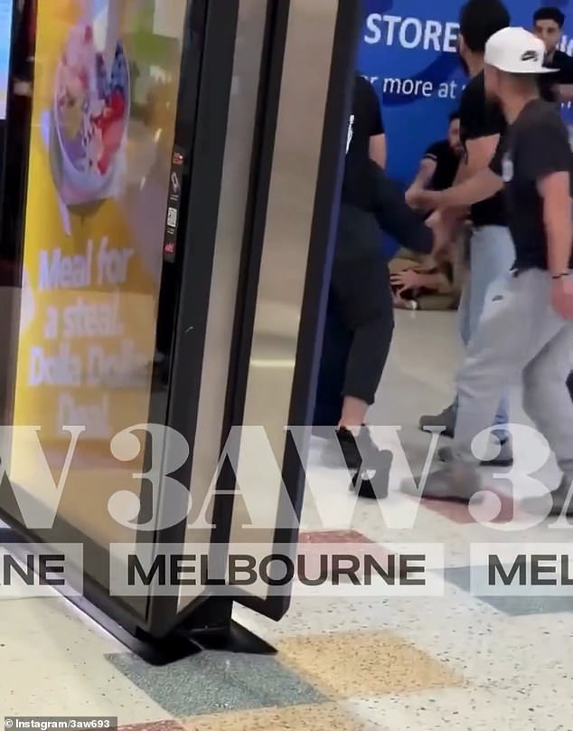 A man with a knife has caused panic in a busy shopping center in Melbourne's northwest.