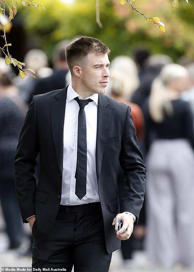 Essendon captain Zach Merrett attended Hannah McGuire's funeral on Thursday.