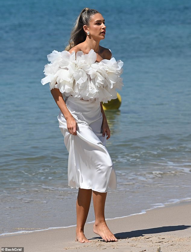 The Love Island star posed for glamorous photographs during a L'Oreal photoshoot on the beach in the heart of the French Riviera.