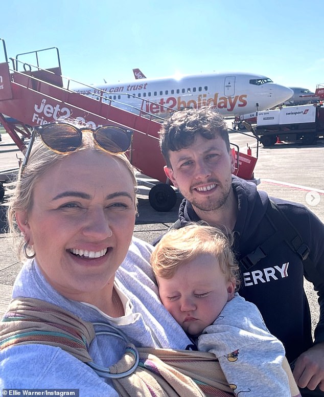 A sunny selfie captured the family trio next to the plane before boarding, while Ellie held her little one in an attached baby carrier.