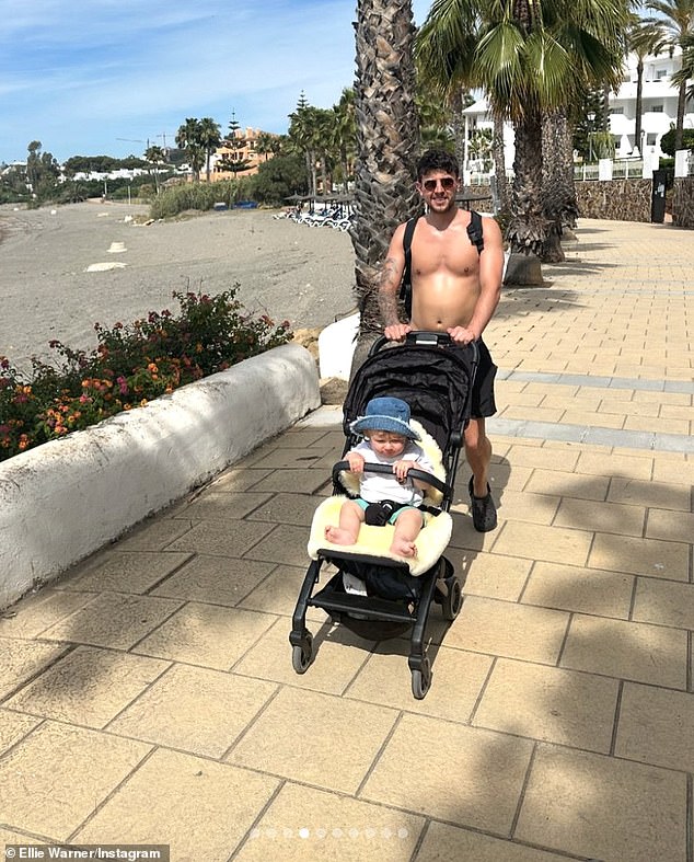 Another shot captured the doting dad walking around the tropical location with the little one in the stroller.