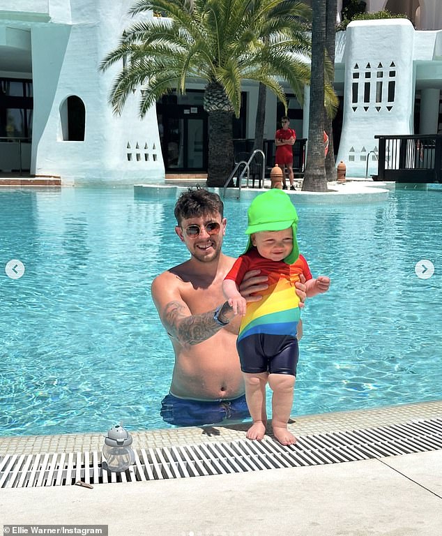 A heartwarming snap captured Nat playing with little Ezra next to a pool.