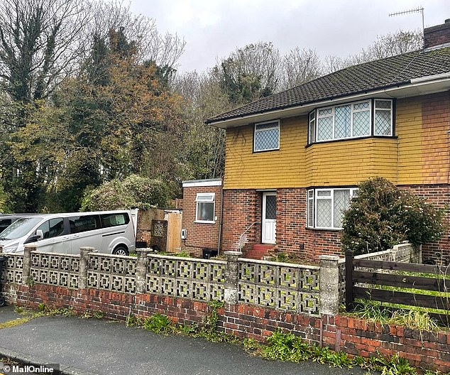 Cobb runs a successful dog walking and grooming business called Harvey's Walks with his partner from his home. Pictured: Outside Luke Cobb's house.