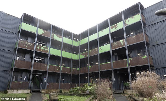 The rusty container houses were built by the city council as 