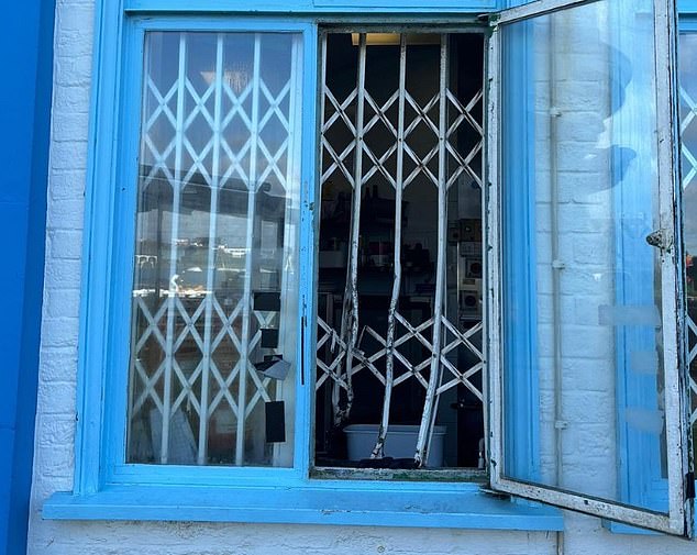 Other snapshots shared show the extent of the damage suffered by the cafe, including warped and broken shutters.