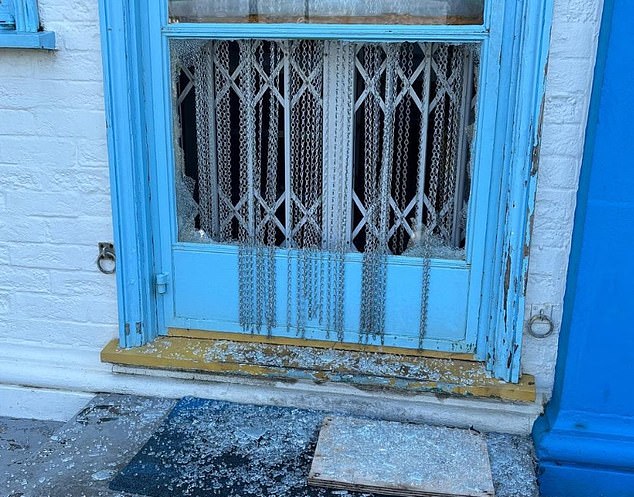 Shards of broken glass could also be seen on the ground in front of the cafe's main entrance.