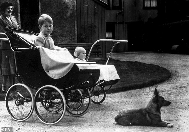 Prince Charles and his sister Princess Anne ride in baby carriages at Birkhall in 1951