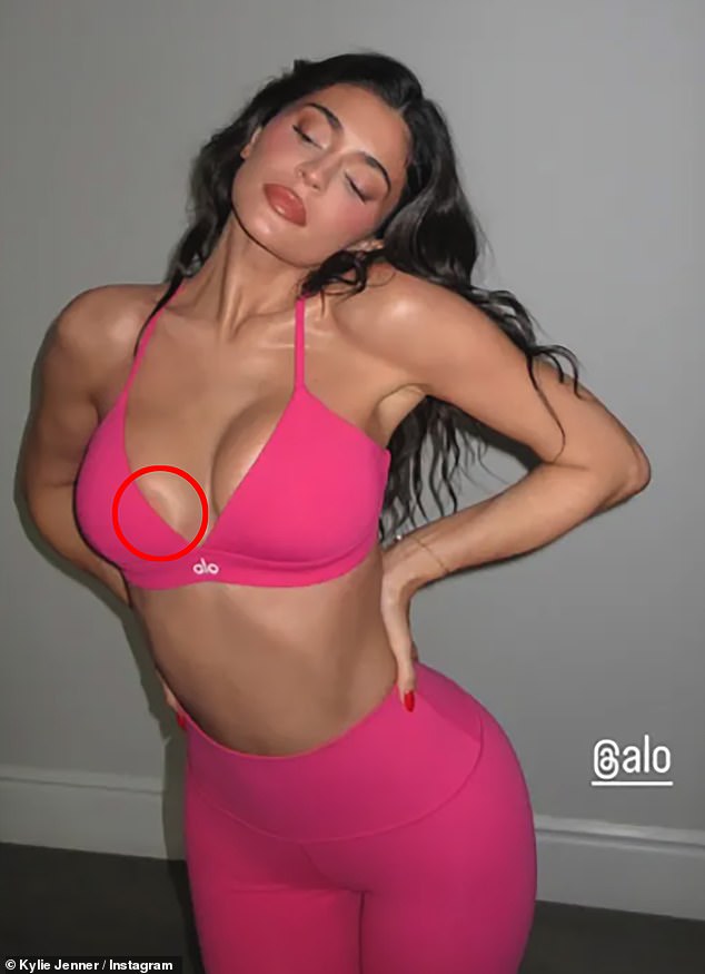 The reality star donned a tiny pink sports bra and matching leggings for the post only to accidentally reveal her nipple covers.