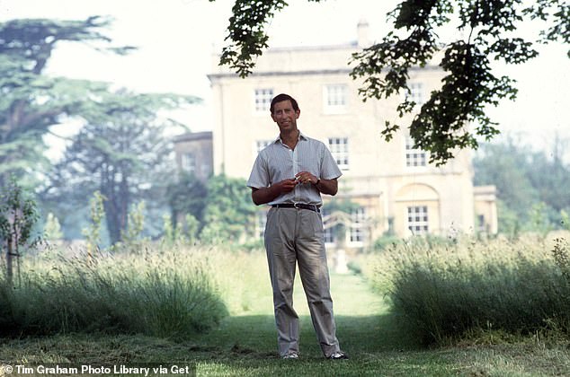 Prince Charles stands in Highgrove Gardens in 1986, when its refurbishment was underway.