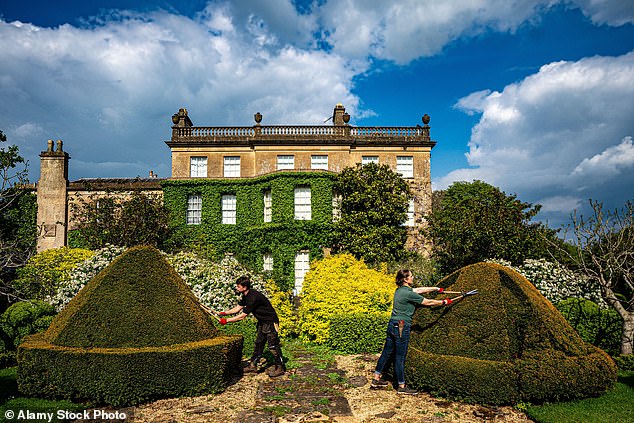 Gardeners tend to the topiary bushes at the private residence of King Charles III and Queen Camilla in Highgrove Gardens, Gloucestershire, ahead of World Topiary Day on May 12.