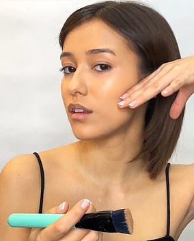 Using your hand as a guide, hold it flat against your face from the top of your ear and point your fingers toward your lips; This shows you where to place the contour product with your brush.