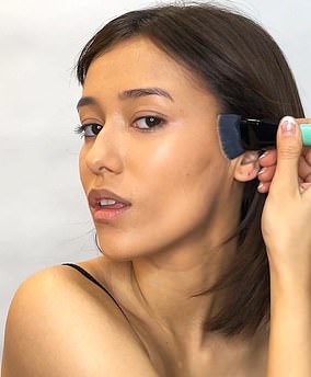 Drag the brush up toward the top of the ear so there are no harsh lines.