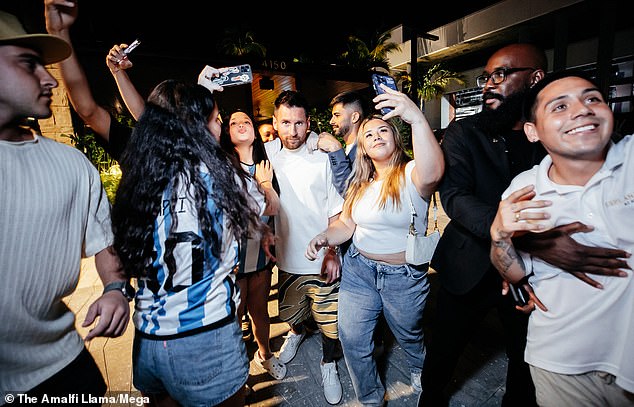 Several fans wearing Argentina shirts with Messi's name took photos with the star