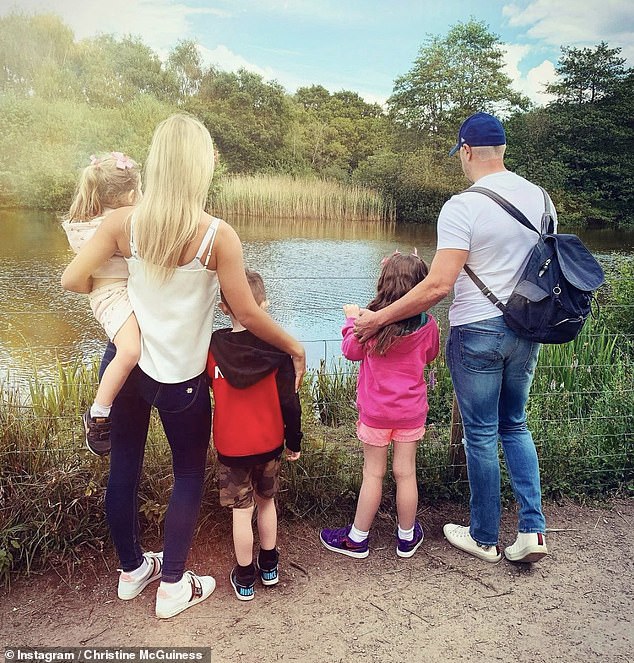 Christine shares twins Penelope and Leo, 10, and Felicity, 7, with Paddy, 50, and they all still live together (pictured in 2021).