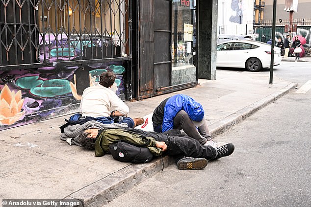 Homeless people are seen as the city battles widespread fentanyl addiction in San Francisco, California, United States, on May 16, 2024.